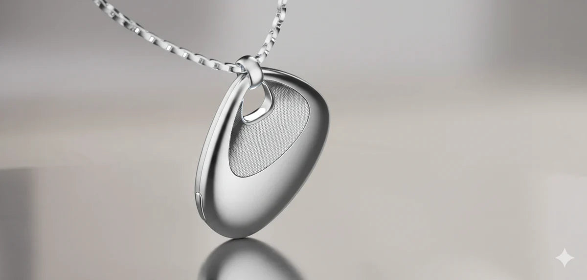 The Legend AI pendant worn discreetly, designed to disappear like jewelry