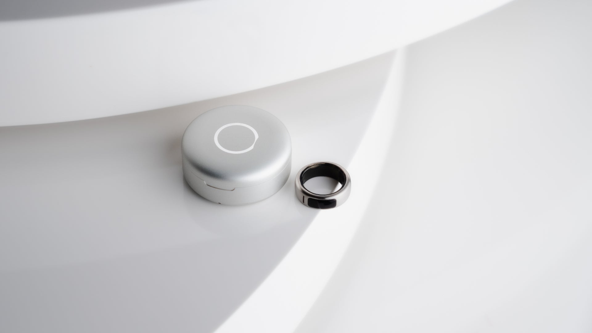 The OASIS 1 smart ring, which pairs whisper dictation with a 2D trackpad. Photo via T3 and Oasis Devices