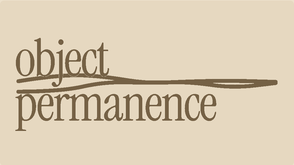 Object permanence: the words object permanence in serif with a gold underline stroke