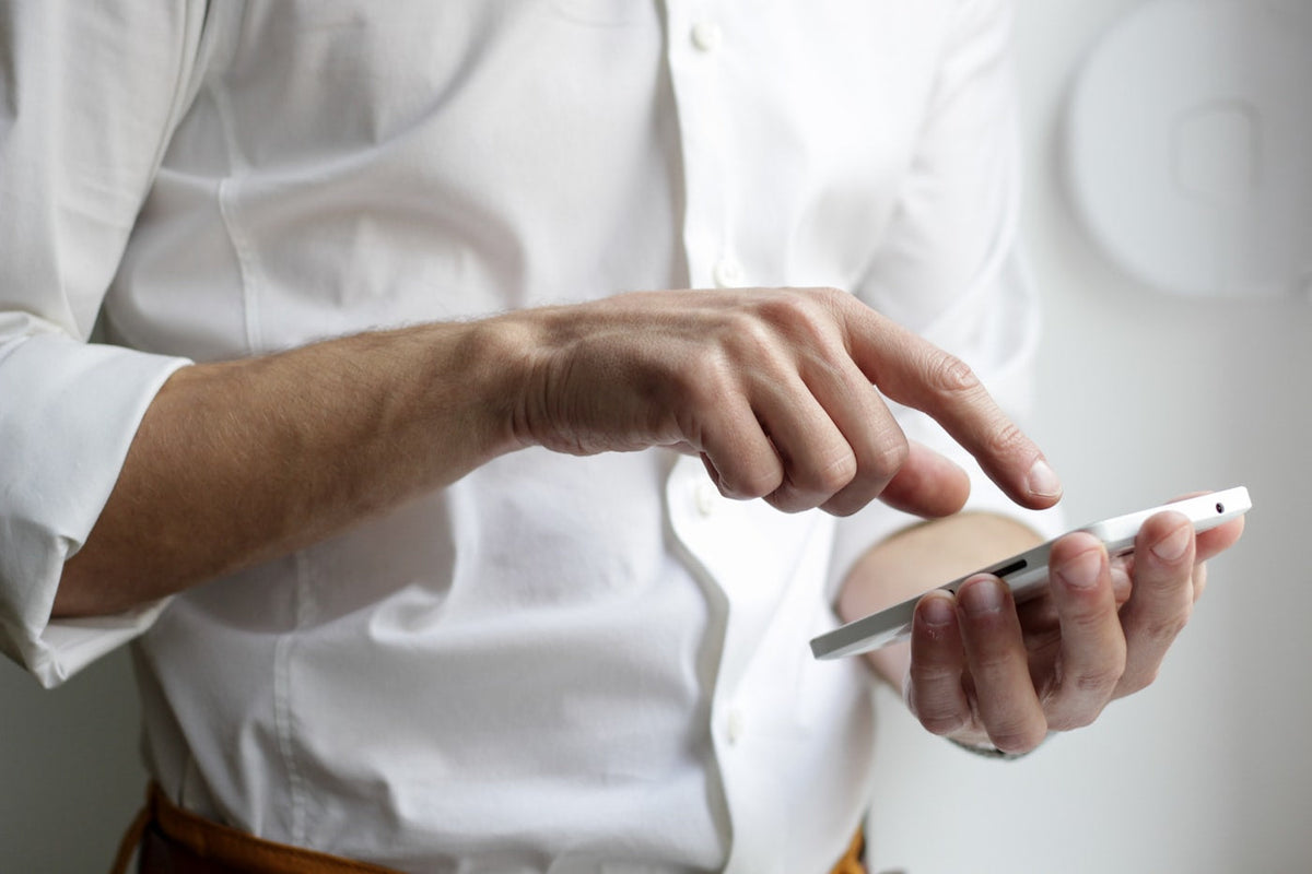 A phone held in one hand, the free capture tool most people already own