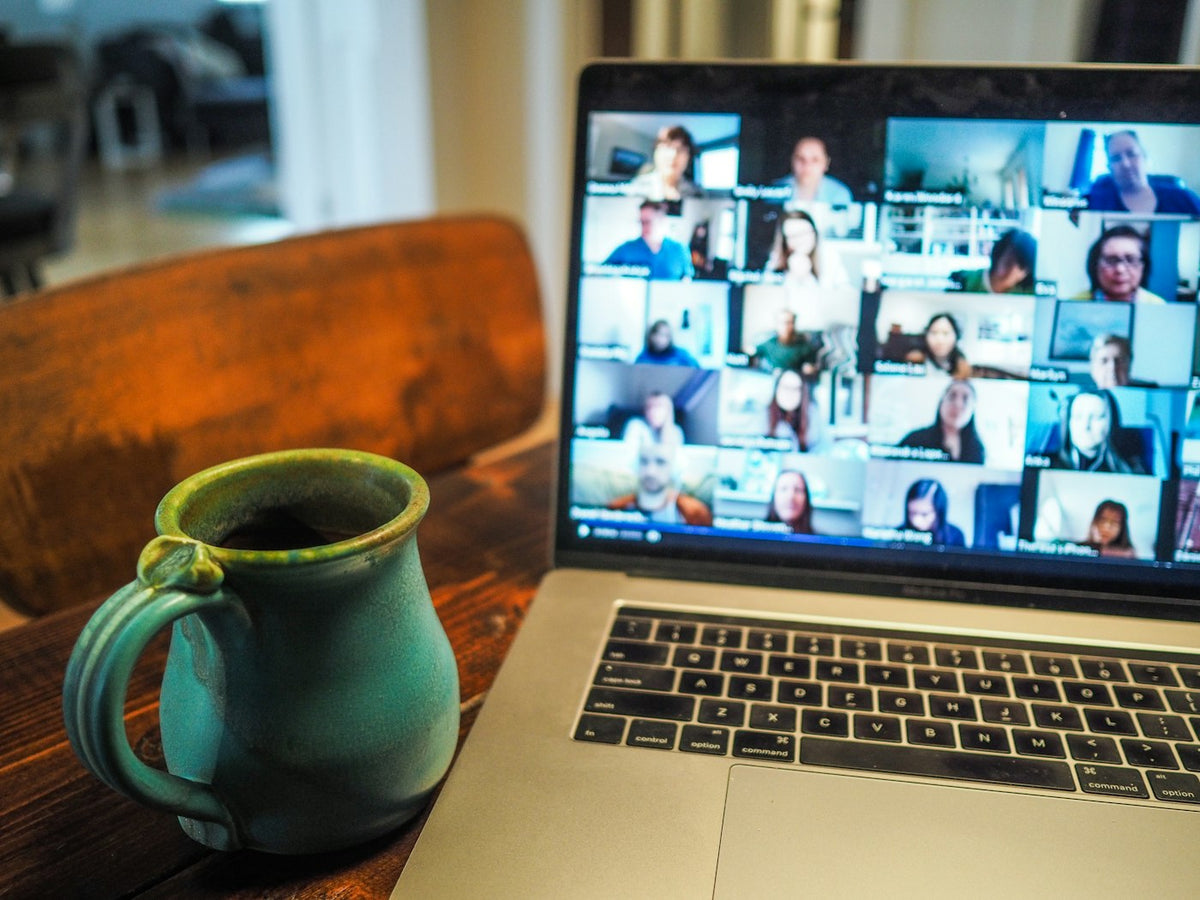 A laptop showing a video call, the setting Granola was built around before AI note-taking reached the wrist